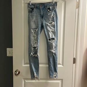 American Eagle size 6 distressed blue ripped jeans